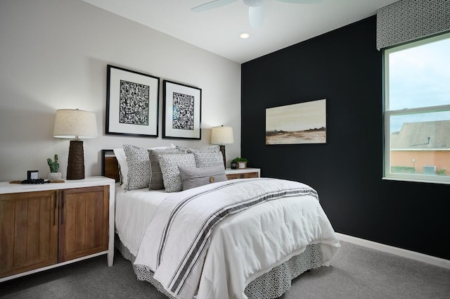 carpeted bedroom with ceiling fan