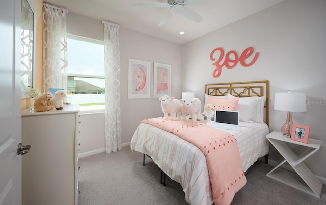 carpeted bedroom featuring ceiling fan