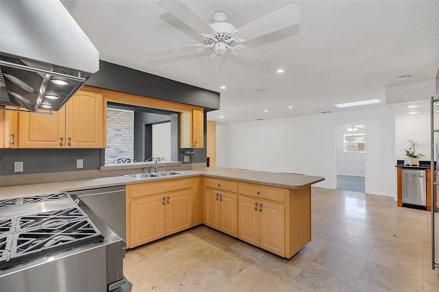 kitchen featuring sink, island range hood, kitchen peninsula, ceiling fan, and light brown cabinets