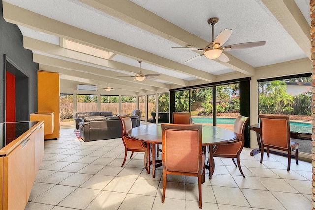 sunroom / solarium with beam ceiling and ceiling fan