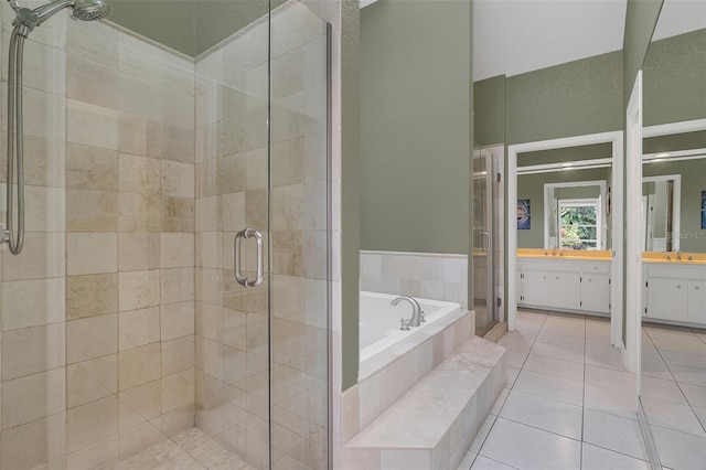 bathroom with vanity, plus walk in shower, and tile patterned floors