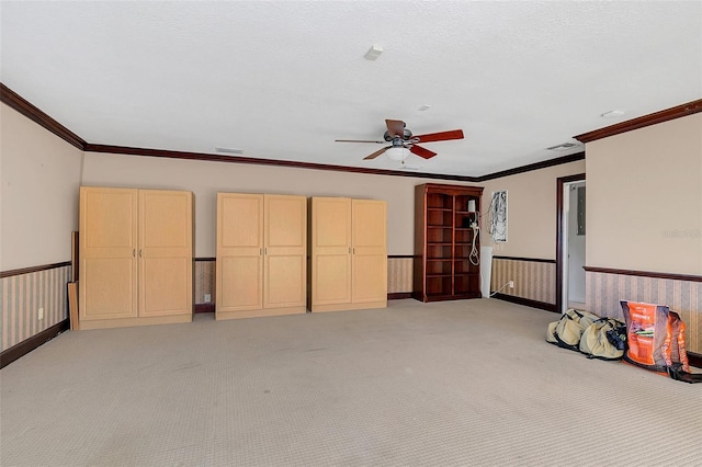 interior space with ceiling fan