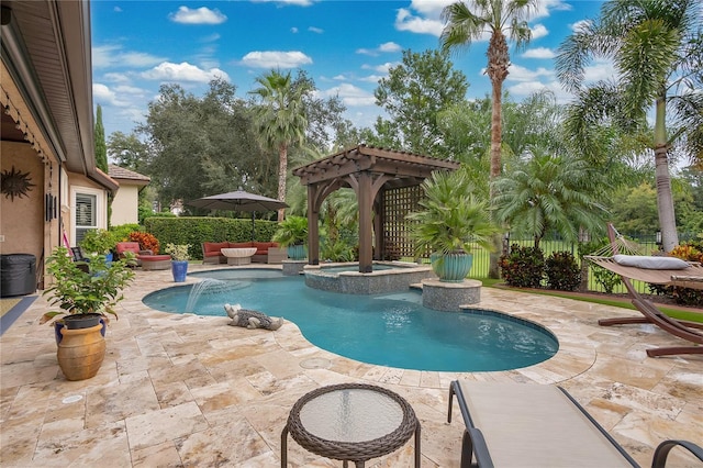 view of swimming pool featuring an in ground hot tub, pool water feature, and a patio area