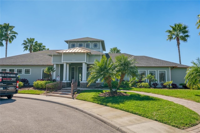 view of front of property with a front yard