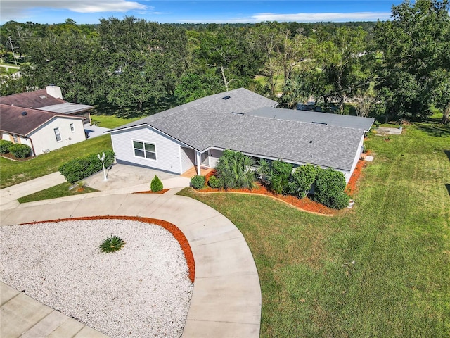 2281 E Union Cir, Deltona, FL 32725 - birds eye view of property featuring a view of trees