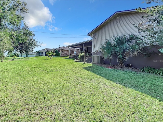 2281 E Union Cir, Deltona, FL 32725 - view of yard featuring central AC