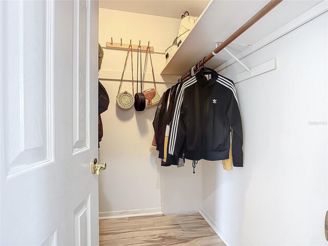 2281 E Union Cir, Deltona, FL 32725 - spacious closet featuring wood finished floors