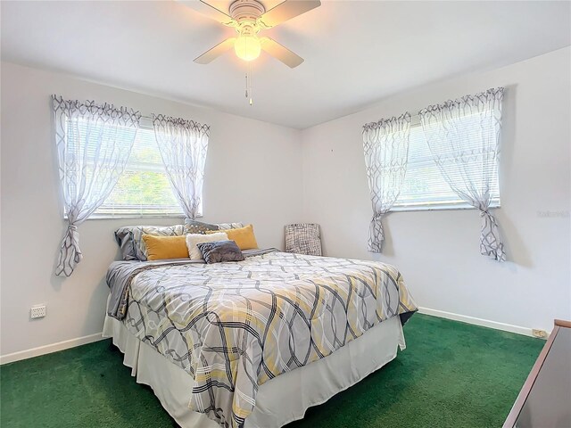 2281 E Union Cir, Deltona, FL 32725 - carpeted bedroom featuring ceiling fan and baseboards