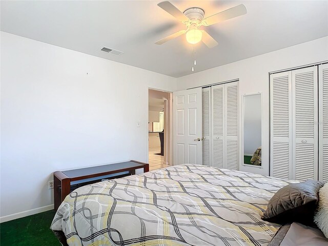 2281 E Union Cir, Deltona, FL 32725 - bedroom with visible vents, carpet floors, baseboards, multiple closets, and a ceiling fan