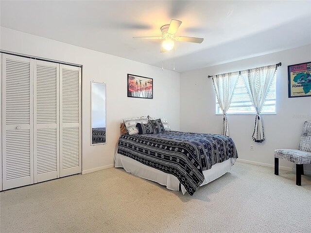 2281 E Union Cir, Deltona, FL 32725 - carpeted bedroom with baseboards, ceiling fan, and a closet
