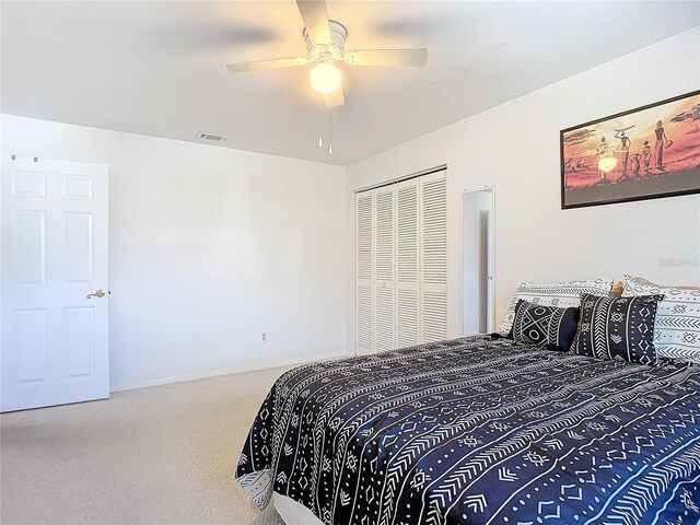 2281 E Union Cir, Deltona, FL 32725 - bedroom featuring carpet flooring, a closet, visible vents, and ceiling fan