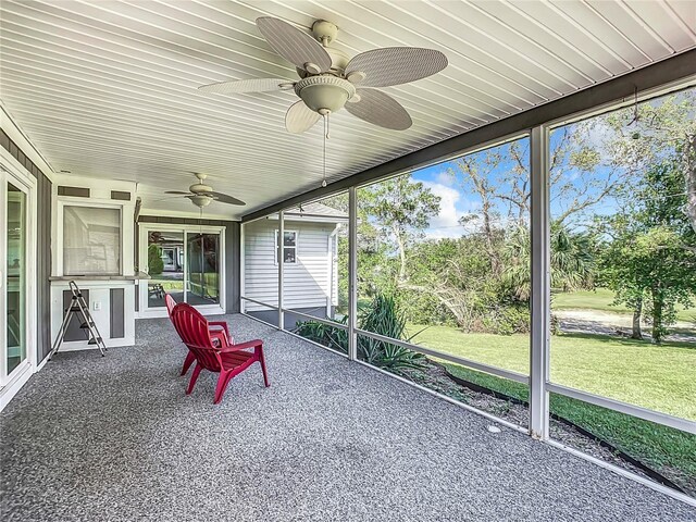 2281 E Union Cir, Deltona, FL 32725 - unfurnished sunroom featuring a ceiling fan and plenty of natural light
