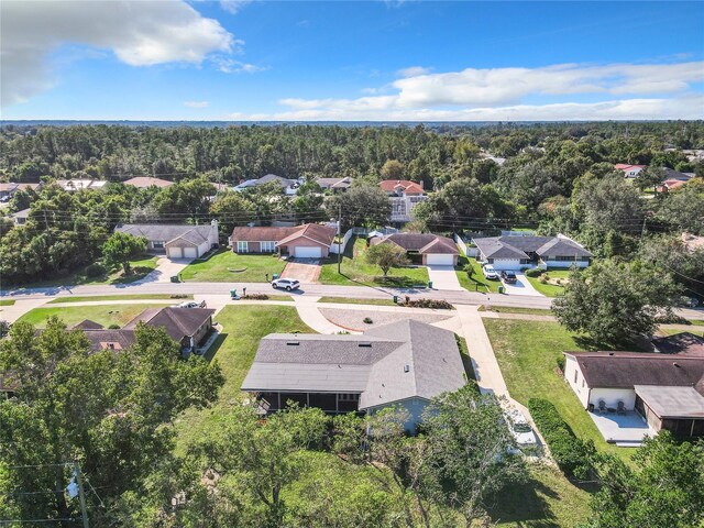 2281 E Union Cir, Deltona, FL 32725 - bird's eye view featuring a residential view and a forest view