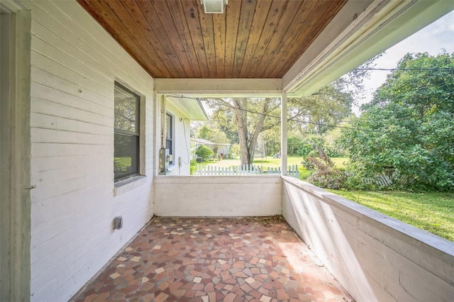 view of patio featuring a balcony