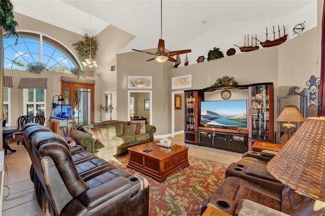 living room featuring ceiling fan and high vaulted ceiling