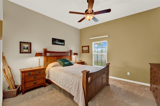 bedroom with light carpet and ceiling fan