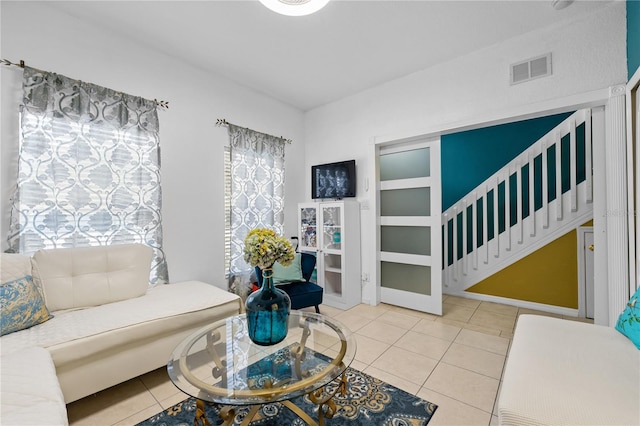 living room featuring tile patterned flooring