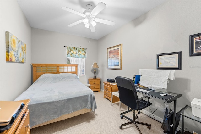 bedroom featuring ceiling fan and light colored carpet