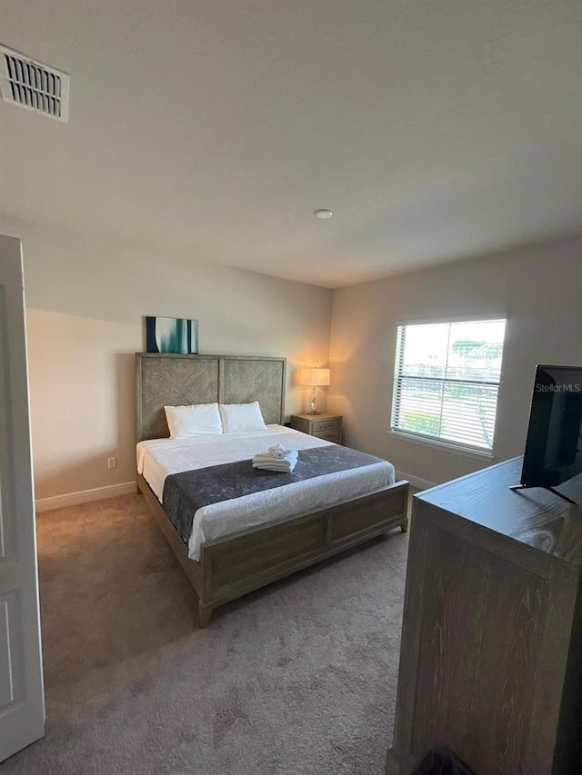 226 Macaulays Cv, Haines City, FL 33844 - carpeted bedroom with baseboards