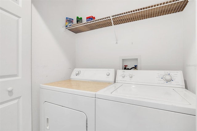 laundry room with washer and dryer