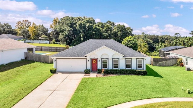 view of front facade featuring a garage and a front yard