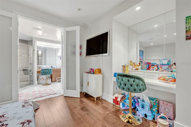 bedroom with light hardwood / wood-style floors