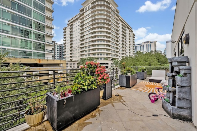 view of patio with a balcony