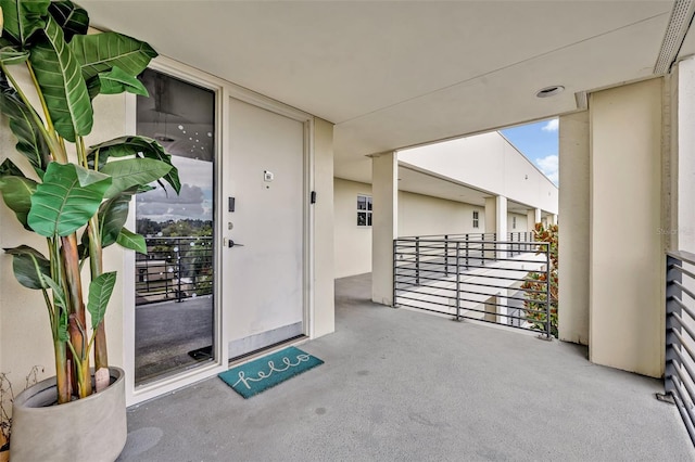 doorway to property featuring a balcony