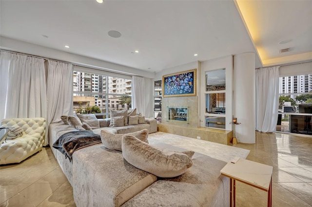 living room featuring a fireplace