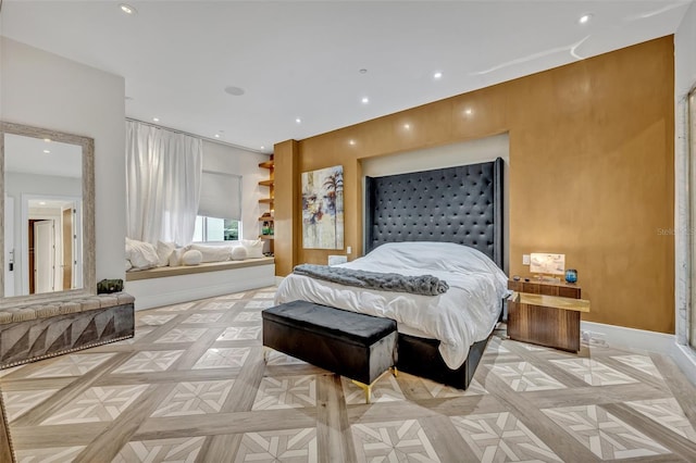 bedroom featuring light parquet flooring