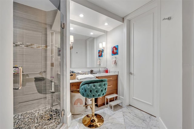 bathroom with vanity and walk in shower