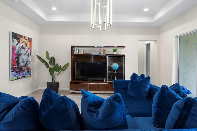 living room with a raised ceiling