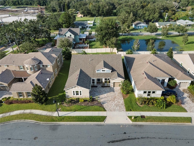 drone / aerial view with a water view