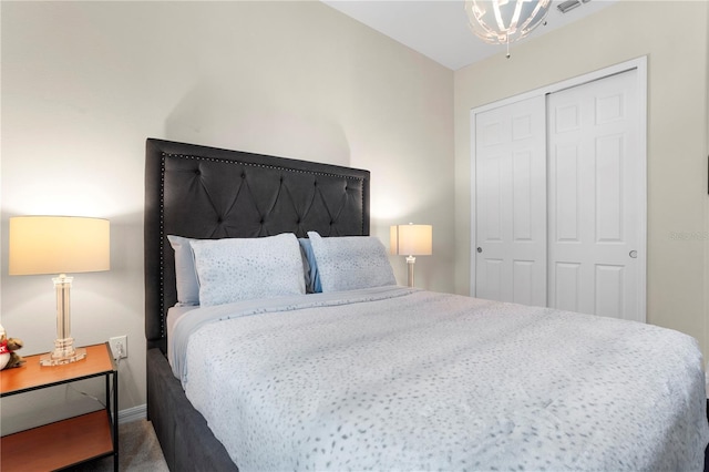 bedroom featuring a closet and dark carpet