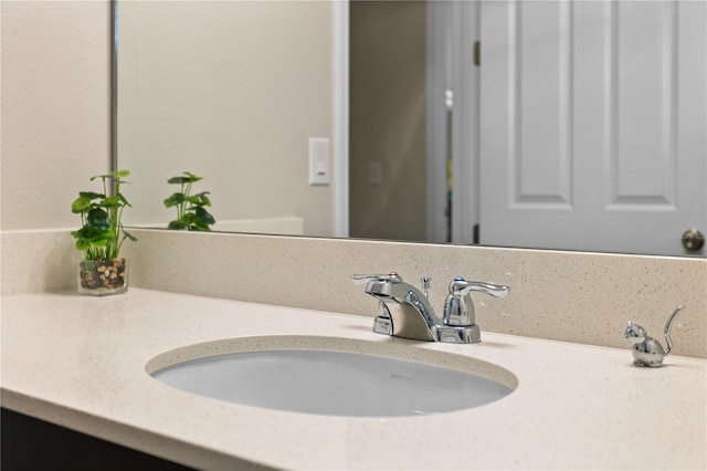 bathroom with vanity and decorative backsplash