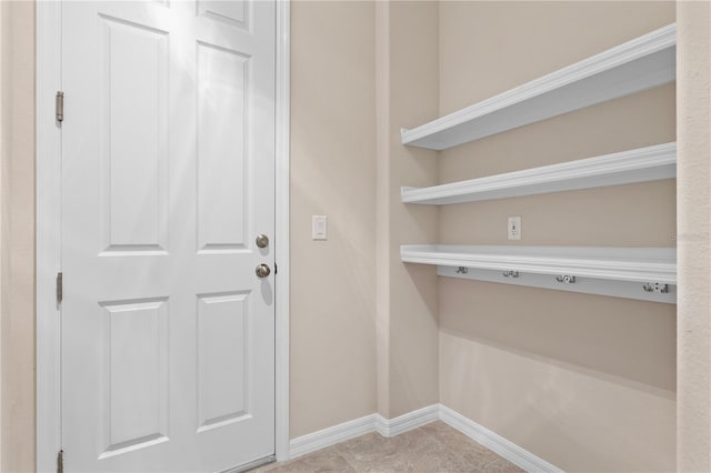 washroom with light tile patterned floors