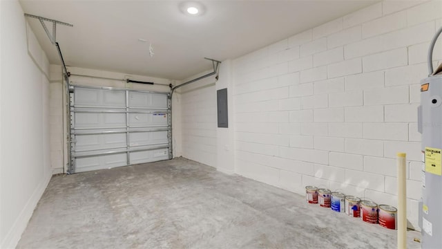 garage featuring water heater and electric panel