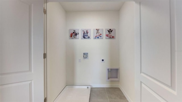 clothes washing area with washer hookup, hookup for an electric dryer, and light tile patterned floors