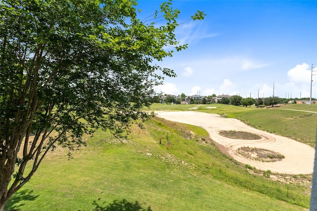 surrounding community featuring a lawn