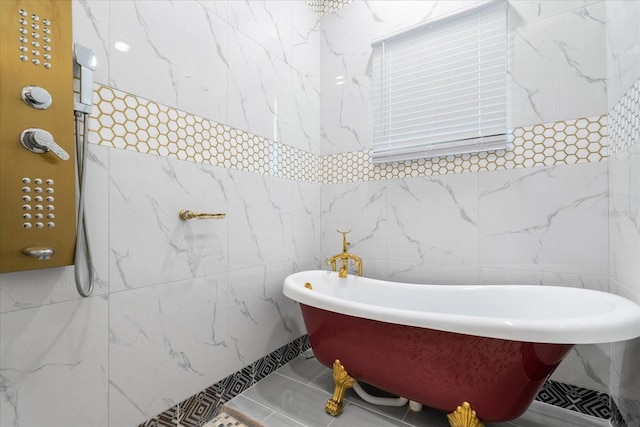 1021 Fantasy Dr, Davenport, FL 33896 - full bath featuring a freestanding tub and tile walls