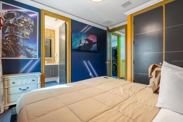 1021 Fantasy Dr, Davenport, FL 33896 - bedroom featuring stacked washer / drying machine, ornamental molding, and connected bathroom