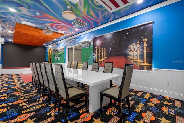 1021 Fantasy Dr, Davenport, FL 33896 - carpeted dining room featuring wainscoting