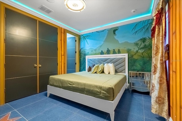 1021 Fantasy Dr, Davenport, FL 33896 - bedroom with dark tile patterned floors and wallpapered walls