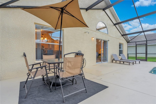 view of patio with a lanai