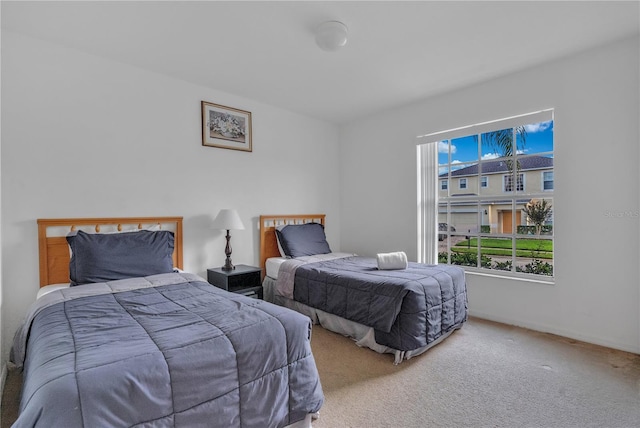 bedroom featuring carpet flooring