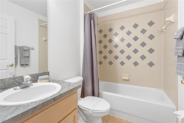 full bathroom with tile patterned floors, shower / bath combo, toilet, and vanity