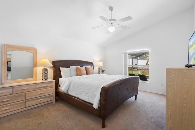 carpeted bedroom with baseboards, a ceiling fan, and lofted ceiling