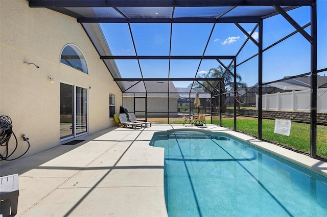 pool with a lawn, a lanai, and a patio area