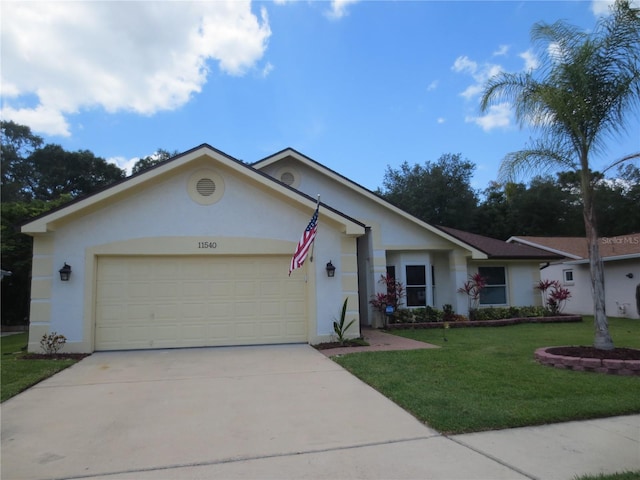 11540 Sandy Hill Dr, Orlando, FL 32821 - ranch-style house with stucco siding, concrete driveway, a garage, and a front lawn