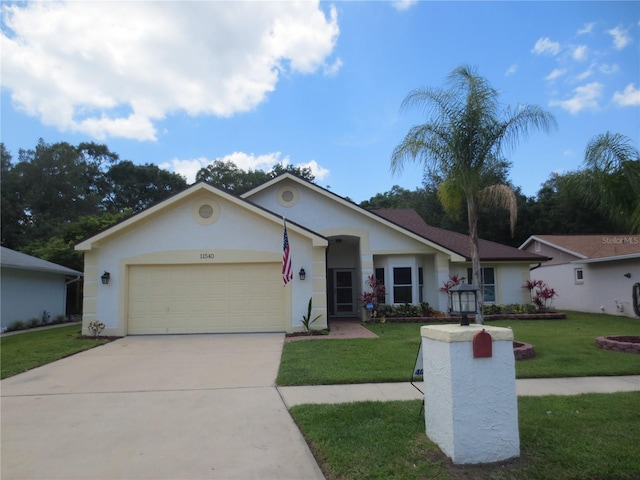 single story home with a front lawn and a garage